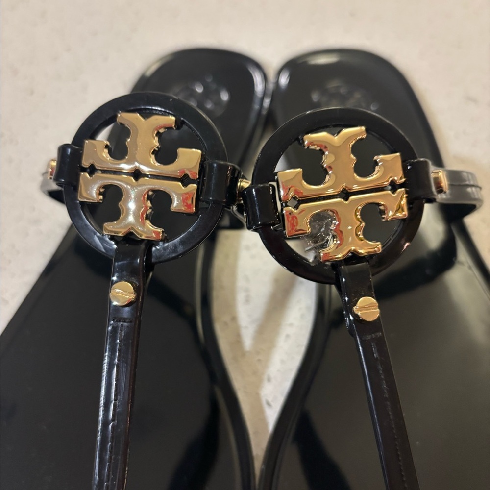Tory Burch Black Sandals with Gold Emblem